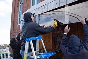 Trinity UCC Members Helping with Putting Up Crèche